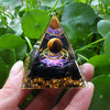 Orgone Pyramid with Amethyst, Peridot, and Healing Crystals