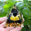 Orgone Pyramid with Amethyst, Peridot, and Healing Crystals